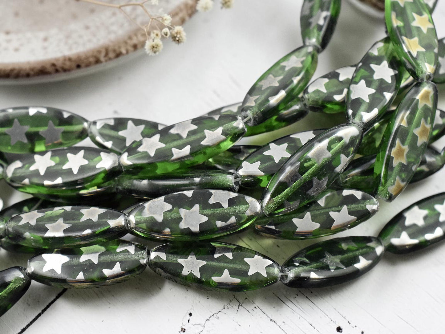 *8* 25x10mm Transparent Sage Star Spindle Beads