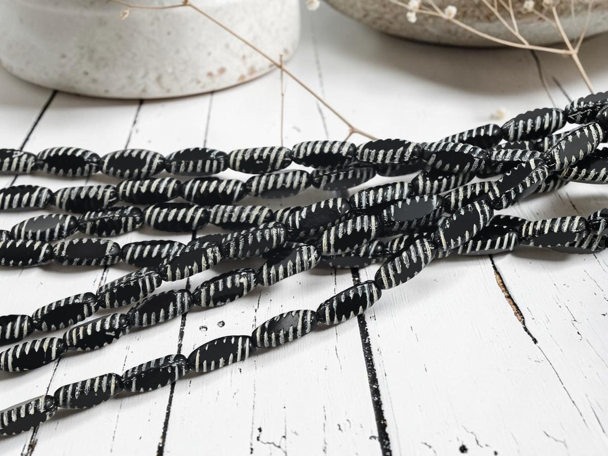 *14* 14x6mm White Washed Jet Black Table Cut Oval Beads