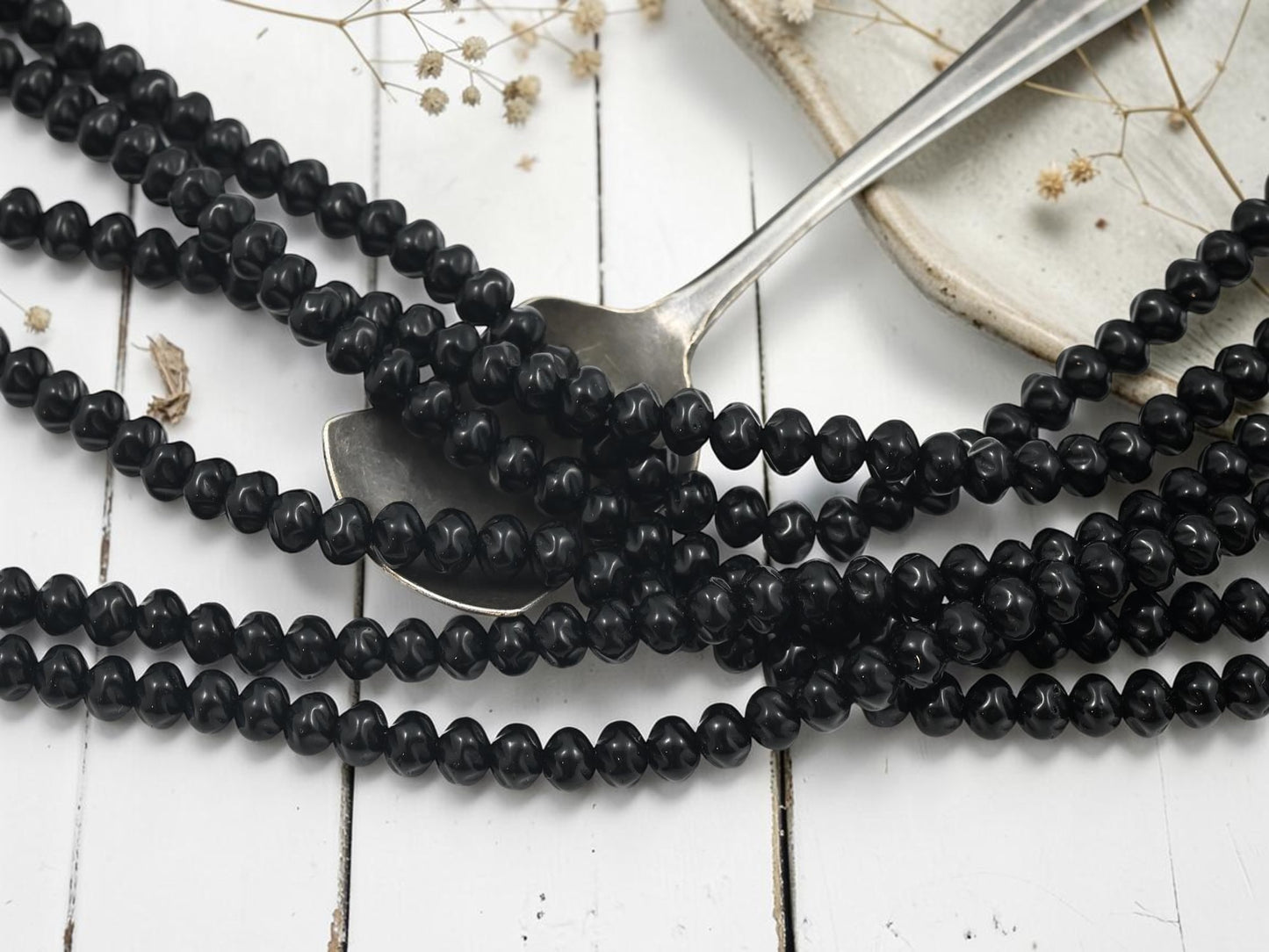 *42* 5x6mm Opaque Jet Black Twisted Rondelle Beads