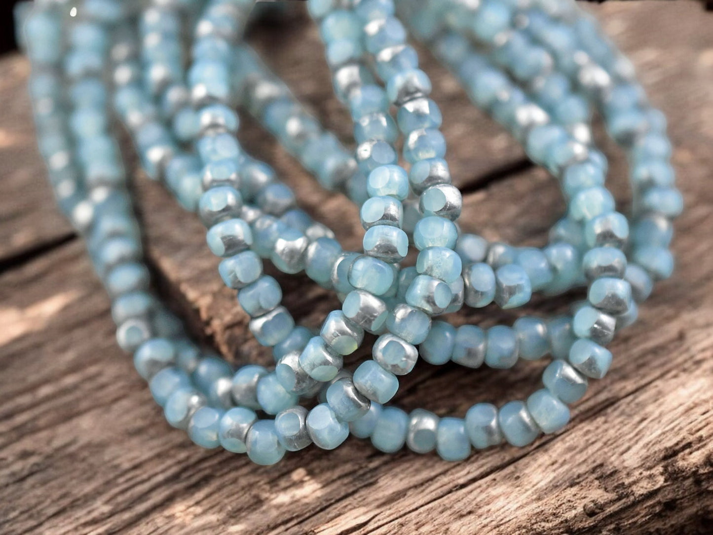 *50* 4x3mm Silver Washed Etched Matte Sky Blue Trica Beads