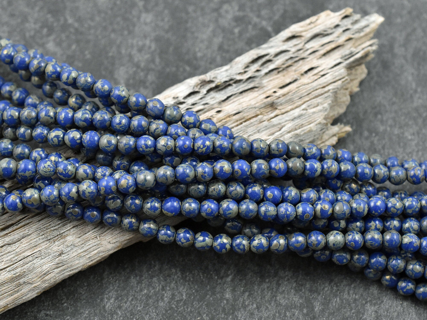 *35* 4mm Azure Blue Picasso Round Druk Beads