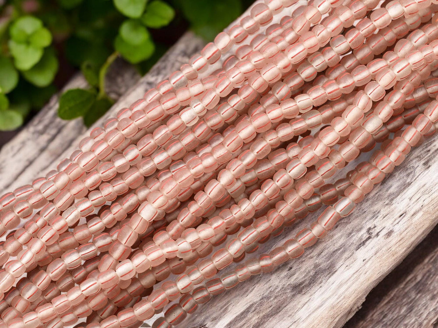 Striped Java Glass Beads. 4-7mm beads. Approx 24" Strands. 6-7 beads per inch.