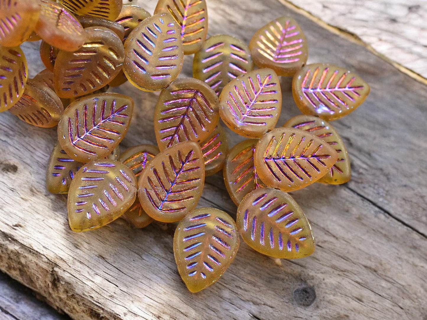 *15* 16x12mm Metallic Volcano Washed Matte Topaz Top Drilled Doogwood Leaf Beads