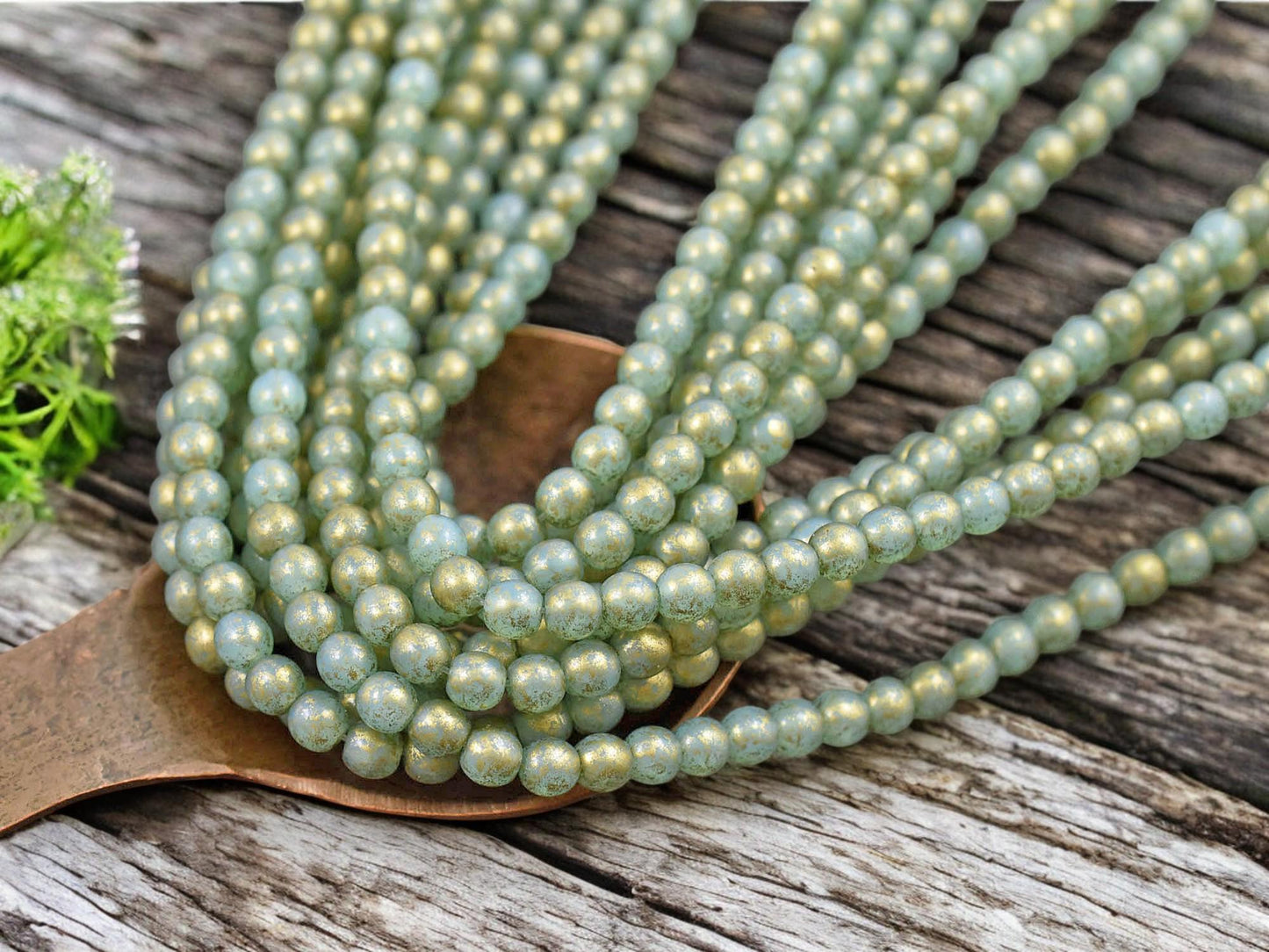 *50* 4mm Gold Washed Aqua Round Druk Beads