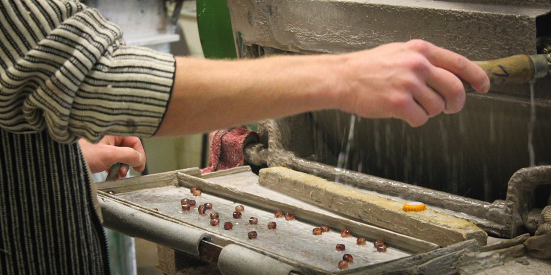 What are Czech pressed glass beads and how are they made?