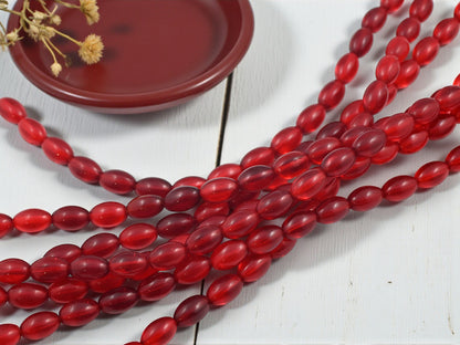 *17* 11x7mm Siam Ruby Oval Rice Beads
