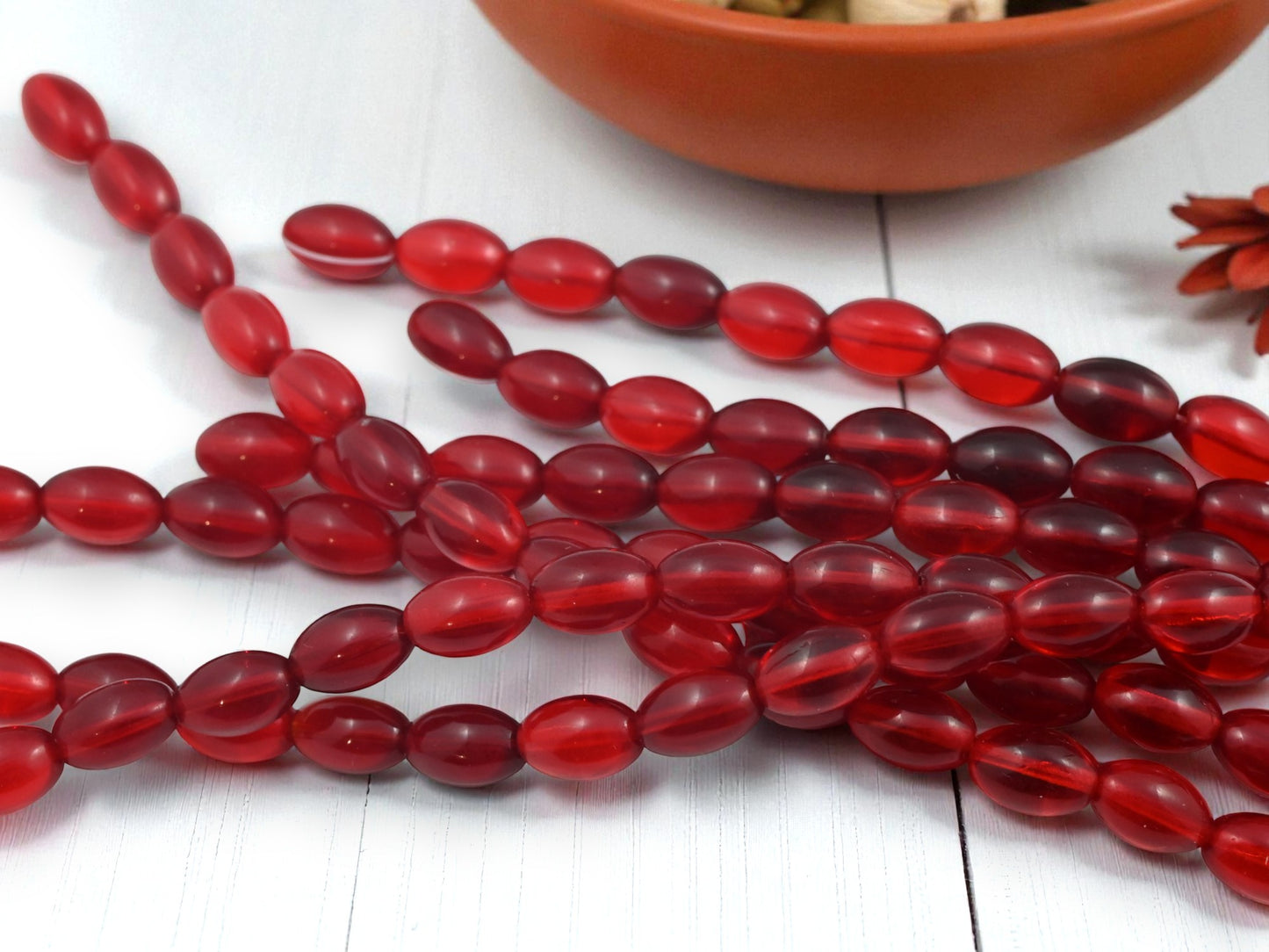 *17* 11x7mm Siam Ruby Oval Rice Beads
