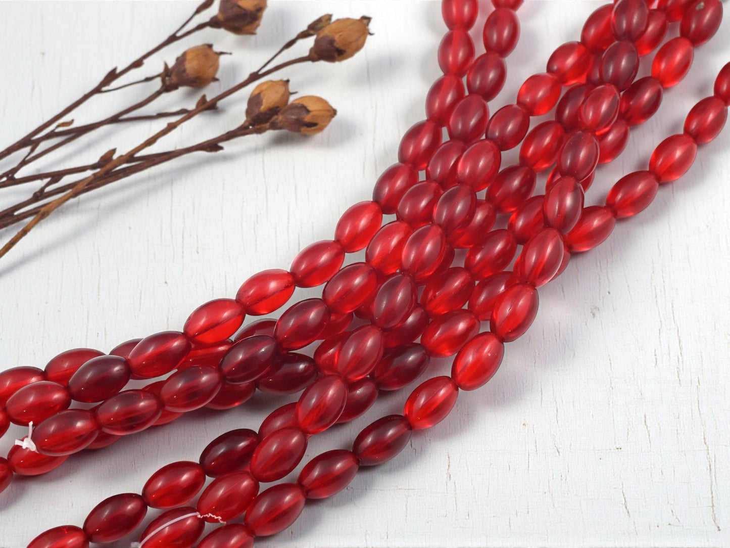 *17* 11x7mm Siam Ruby Oval Rice Beads