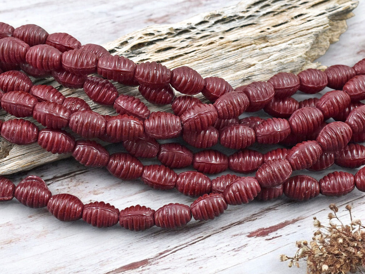 *21* 6x9mm Opaque Red Grooved Oval Beads
