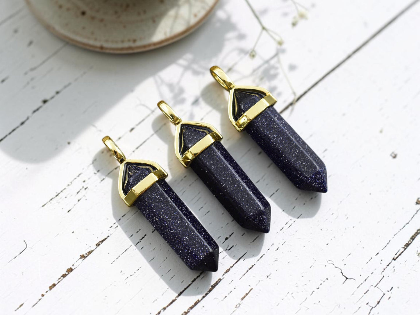 40mm Gold Tone Natural Blue Goldstone Double Terminated Bullet Pendant