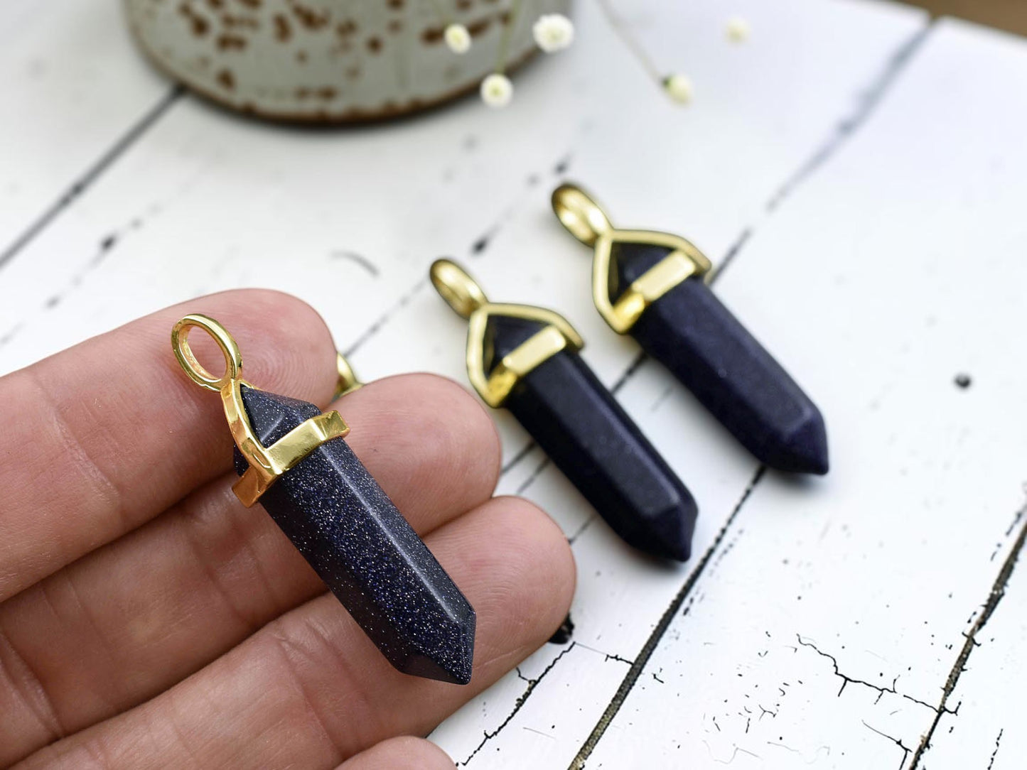 40mm Gold Tone Natural Blue Goldstone Double Terminated Bullet Pendant