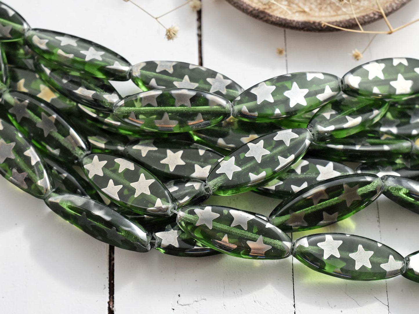 *8* 25x10mm Transparent Sage Star Spindle Beads