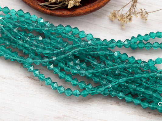 *25* 6mm Tranclucent Teal Lucerna Bicone Beads
