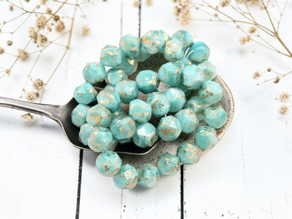 *15* 9mm Antique Gold Washed Opaque Larimar Blue Central Cut Round Beads