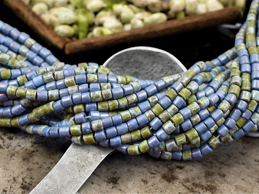 6/0 Aged Blue Turquoise Picasso Bugle Beads (20" Strand)