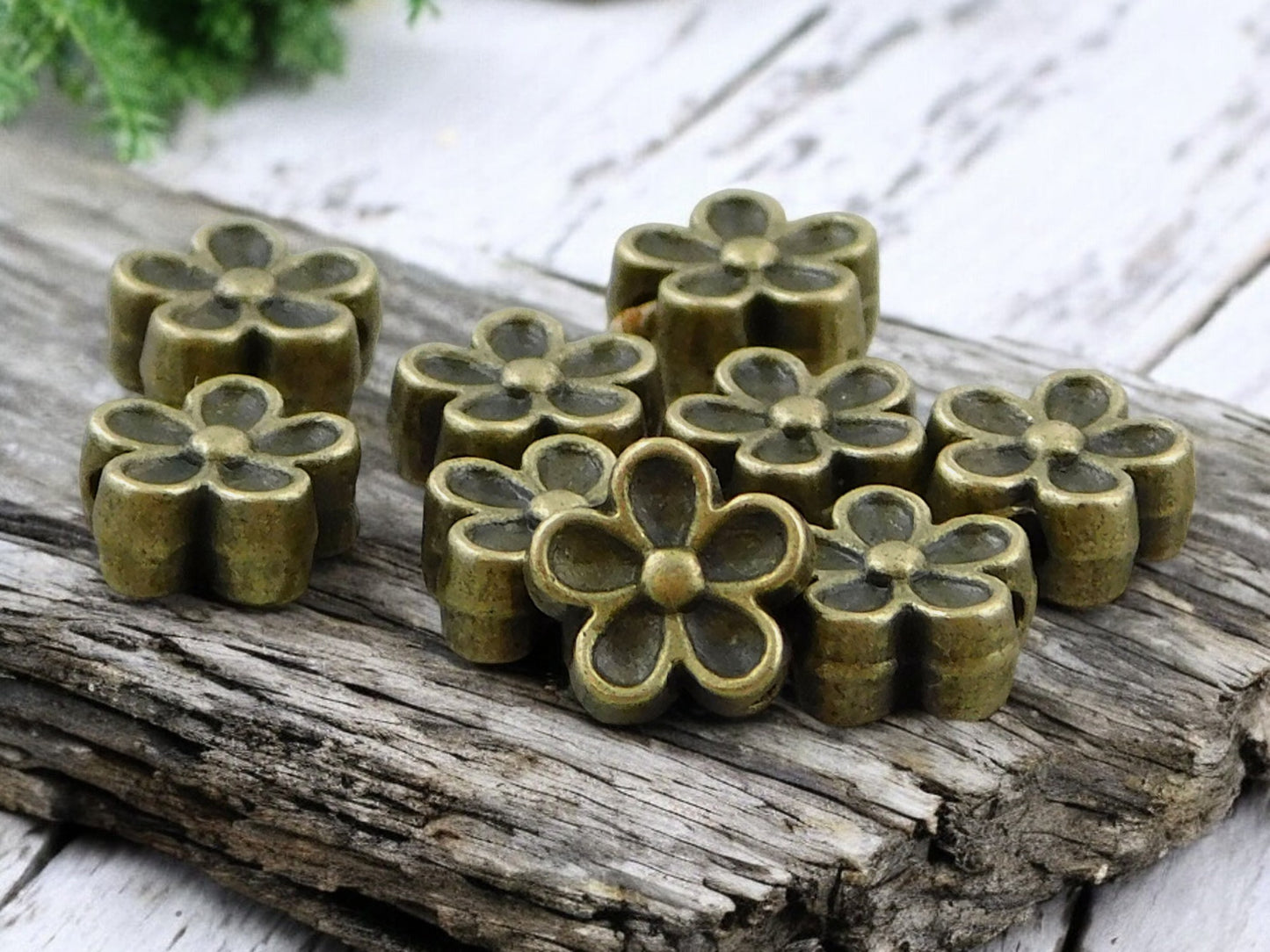*100* 7mm Antique Bronze Hawaiian Flower Beads