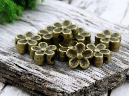 *100* 7mm Antique Bronze Hawaiian Flower Beads