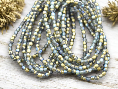 *50* 3mm Gold Washed Etched Montana Blue AB Round Druk Beads