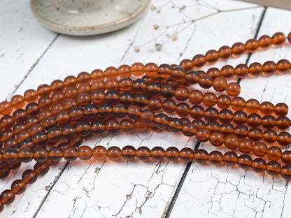 *34* 6mm Root Beer Topaz Round Druk Beads