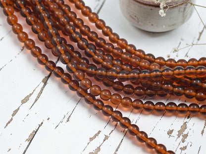 *34* 6mm Root Beer Topaz Round Druk Beads