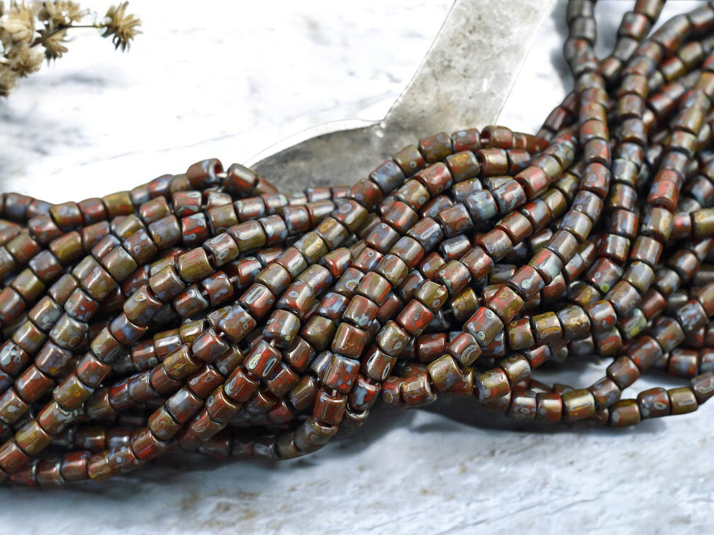 6/0 Aged Dark Red Picasso Bugle Tube Seed Bead Mix (21" Strand)