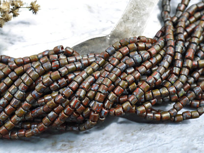 6/0 Aged Dark Red Picasso Bugle Tube Seed Bead Mix (21" Strand)
