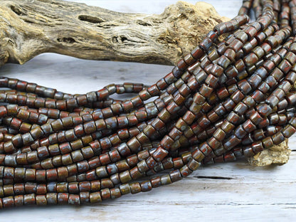6/0 Aged Dark Red Picasso Bugle Tube Seed Bead Mix (21" Strand)