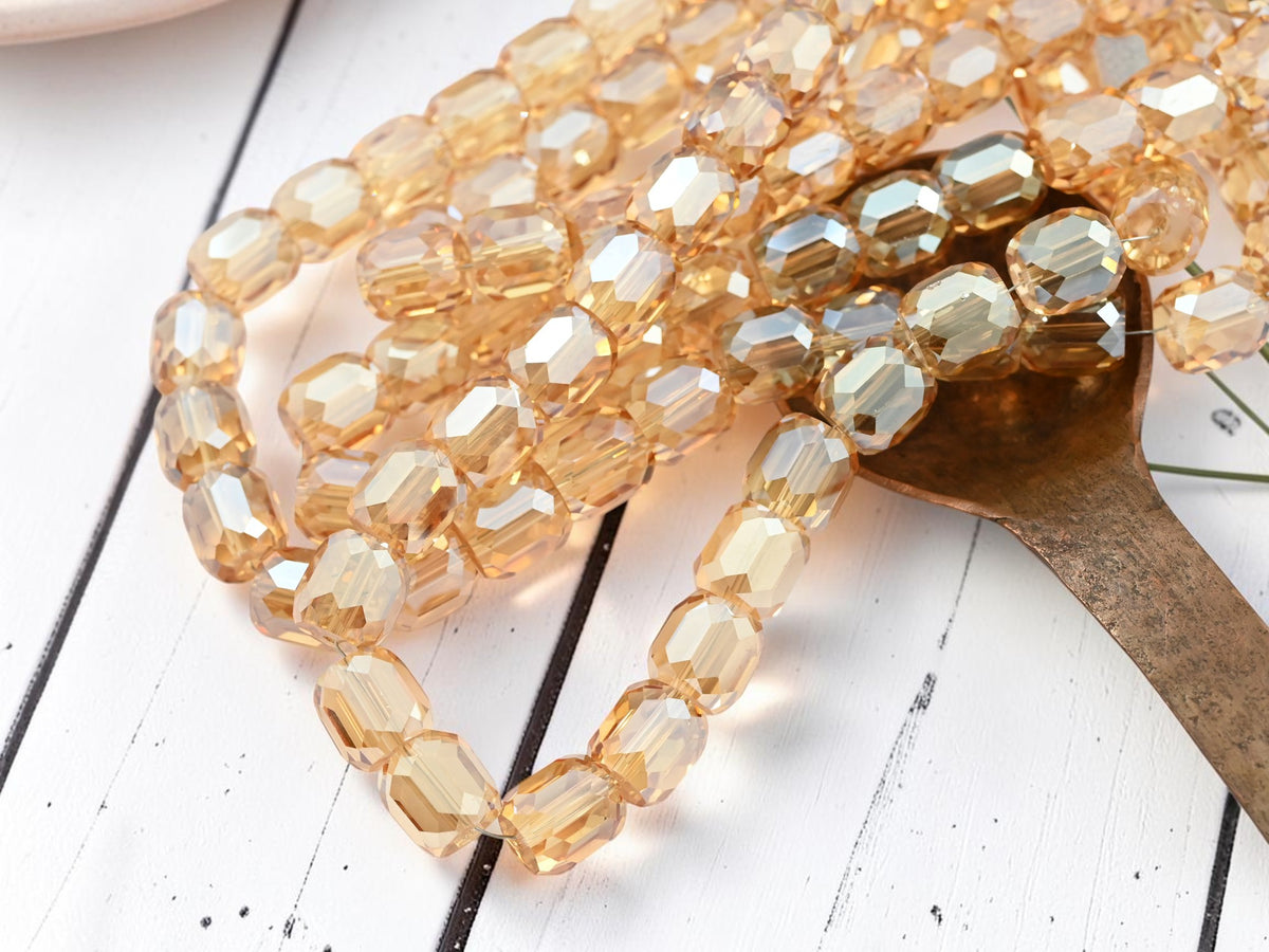 *10* 11x10mm Electroplated Light Topaz Champagne Faceted Barrel Beads
