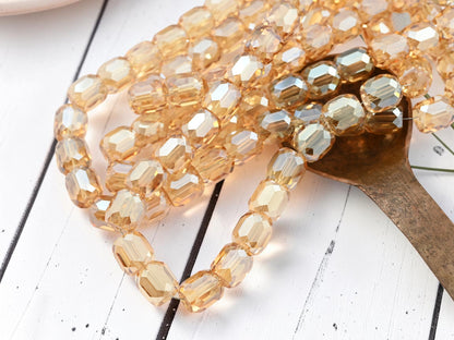 *10* 11x10mm Electroplated Light Topaz Champagne Faceted Barrel Beads