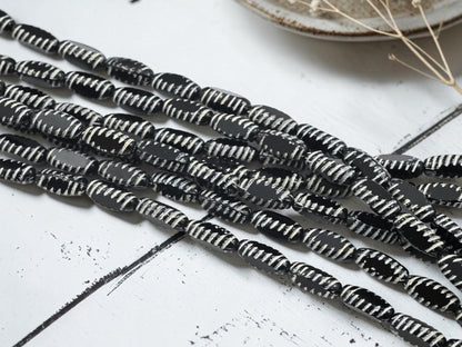 *14* 14x6mm White Washed Jet Black Table Cut Oval Beads