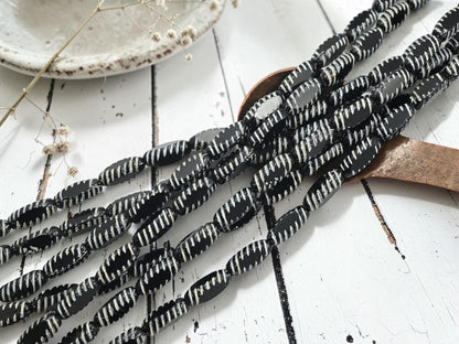 *14* 14x6mm White Washed Jet Black Table Cut Oval Beads