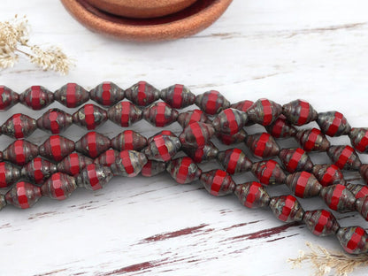 *18* 11x8mm Red Travertine Faceted Turbine Beads