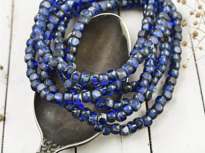 *50* 4x3mm Sapphire Picasso Trica Beads