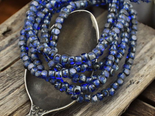 *50* 4x3mm Sapphire Picasso Trica Beads