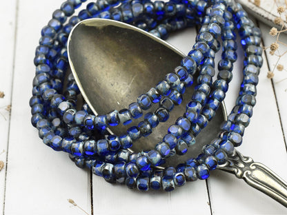 *50* 4x3mm Sapphire Picasso Trica Beads
