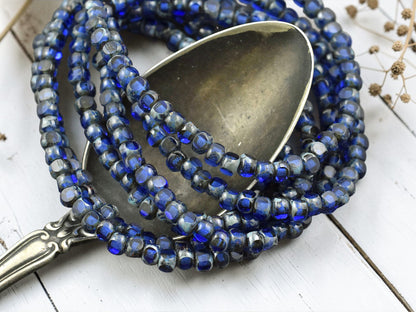 *50* 4x3mm Sapphire Picasso Trica Beads