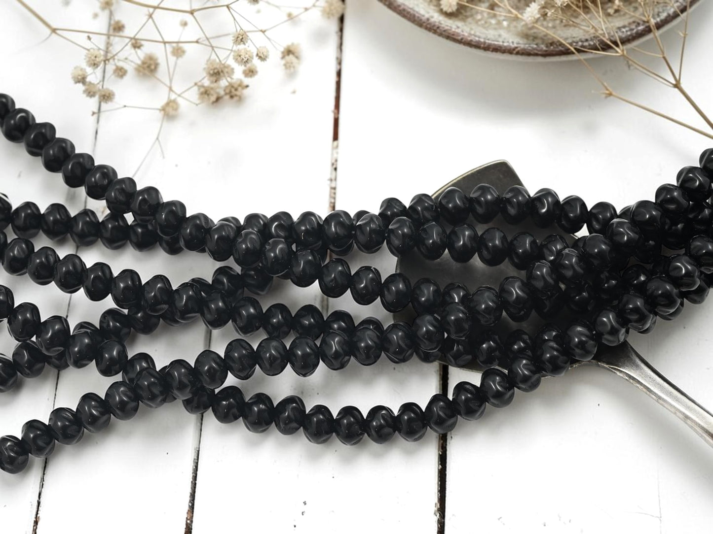 *42* 5x6mm Opaque Jet Black Twisted Rondelle Beads