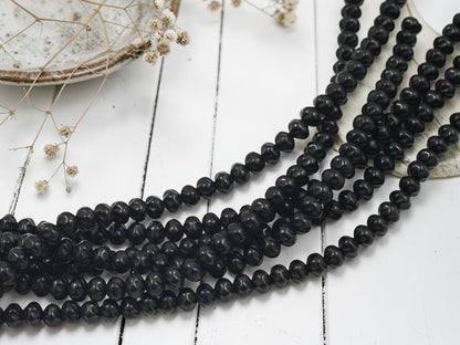 *42* 5x6mm Opaque Jet Black Twisted Rondelle Beads