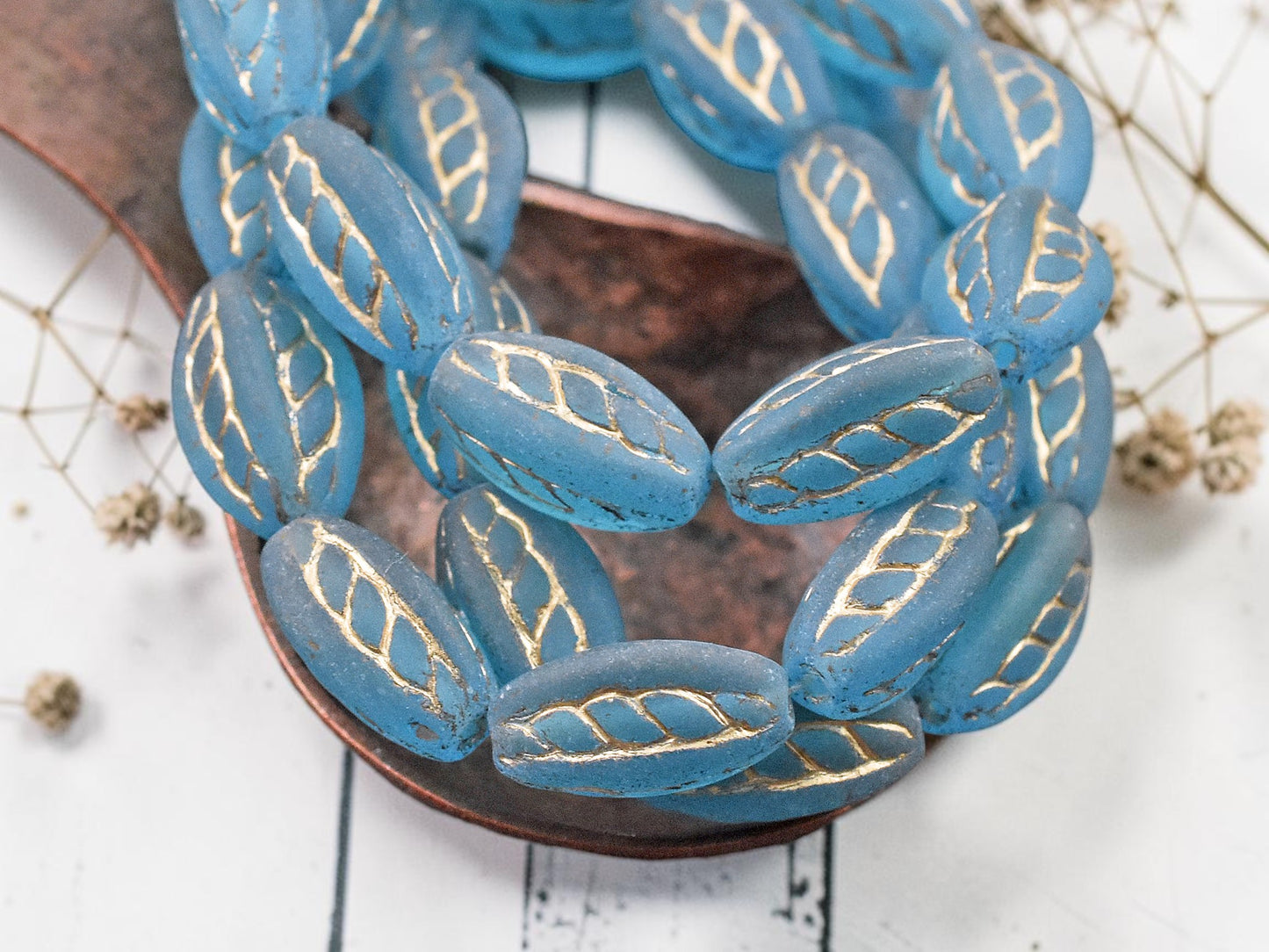 *10* 15x9mm Gold Washed Matte Capri Blue Twisted Oval Beads