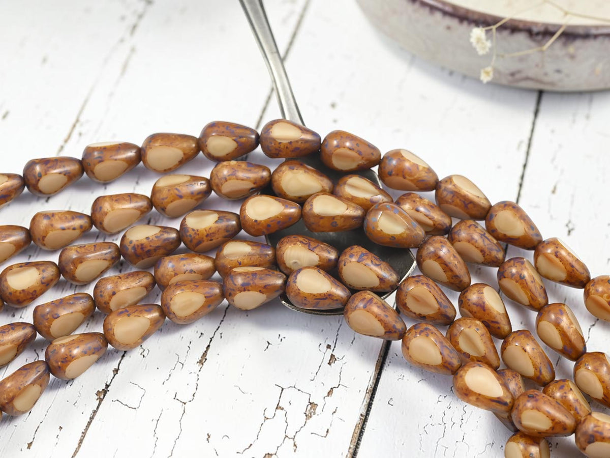 *17* 12x8mm Beige Silk Travertine 3 Cut Teardrop Beads