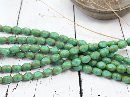 *19* 6x8mm Green Turquoise Picasso Fire Polished Table Cut Oval Beads