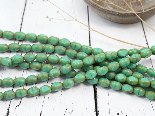 *19* 6x8mm Green Turquoise Picasso Fire Polished Table Cut Oval Beads