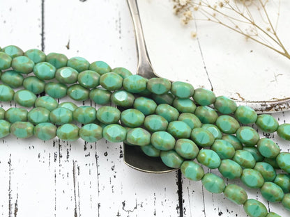 *19* 6x8mm Green Turquoise Picasso Fire Polished Table Cut Oval Beads