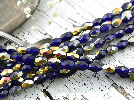 *25* 5x7mm Cobalt Marea Fire Polished Oval Beads