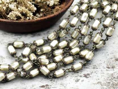 10x5mm Czech Glass Cream Pearl Chain w/Antique Bronze Caps -- Sold by the foot