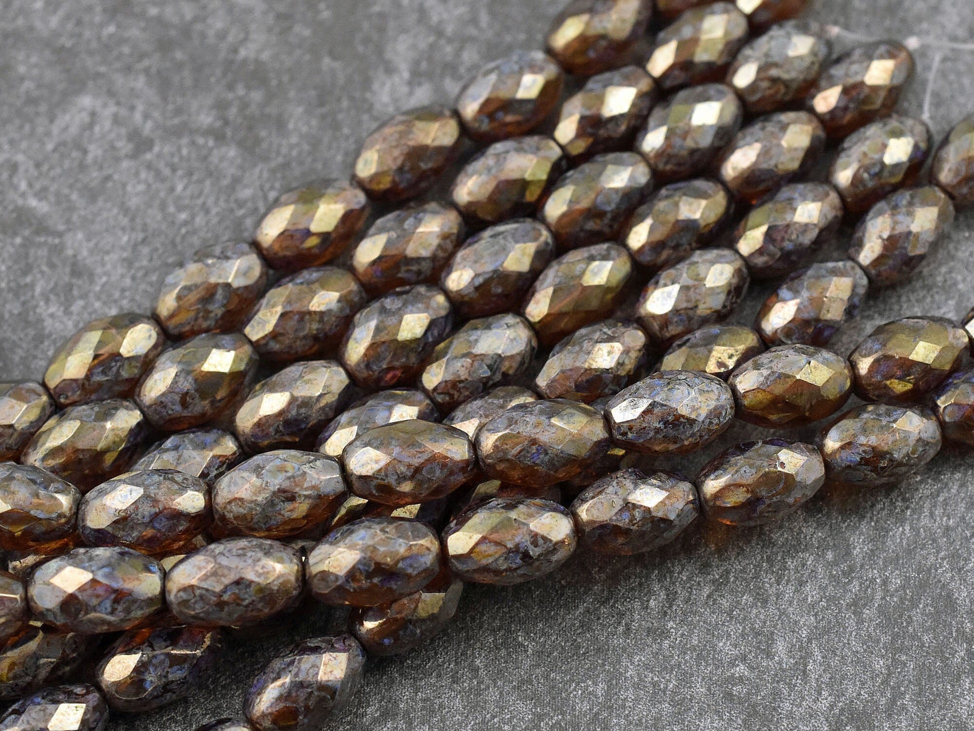 *10* 12x8mm Gold Luster Washed Root Beer Topaz Picasso Fire Polished Faceted Oval Beads