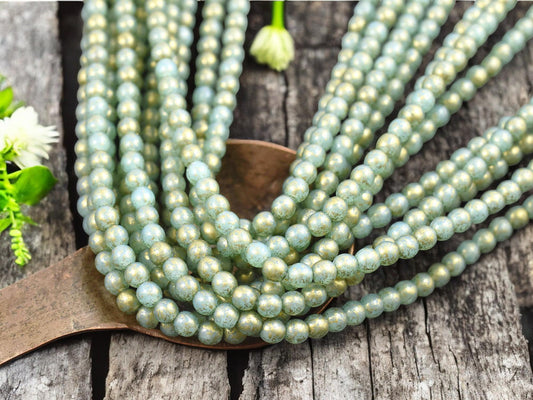 *50* 4mm Gold Washed Aqua Round Druk Beads