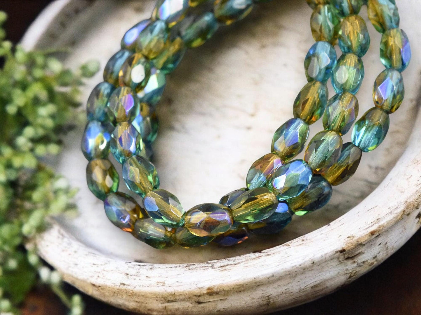 *20* 5x7mm Teal Topaz AB Fire Polished Faceted Oval Beads