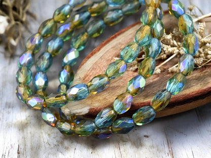 *20* 5x7mm Teal Topaz AB Fire Polished Faceted Oval Beads