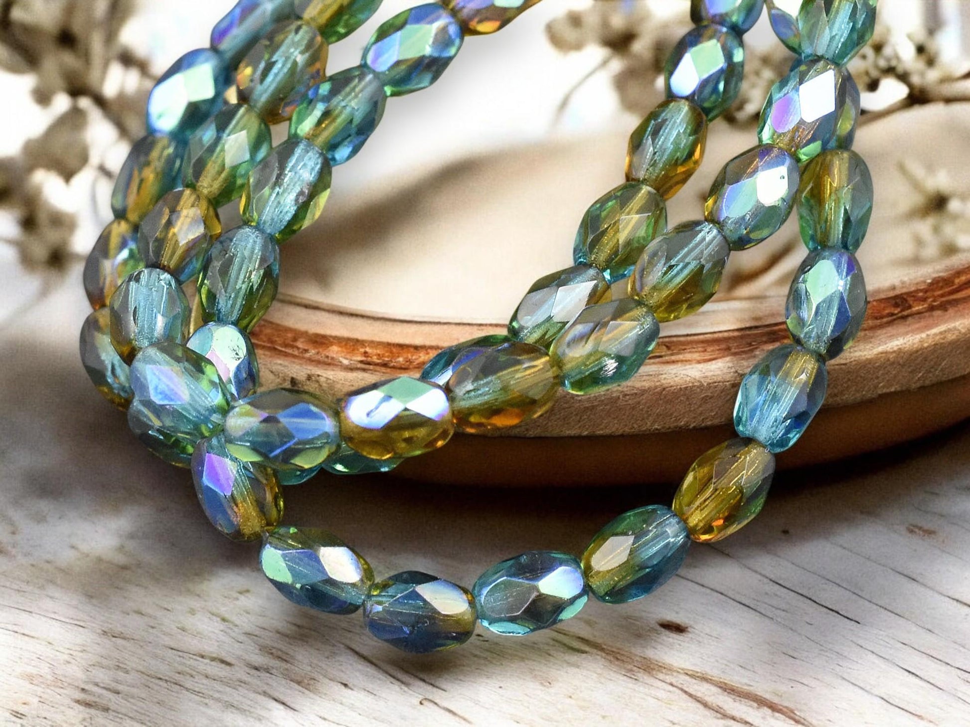 *20* 5x7mm Teal Topaz AB Fire Polished Faceted Oval Beads